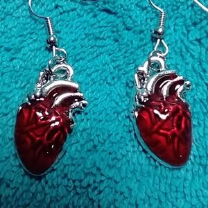 Silvertone intricate red human heart wire earrings love